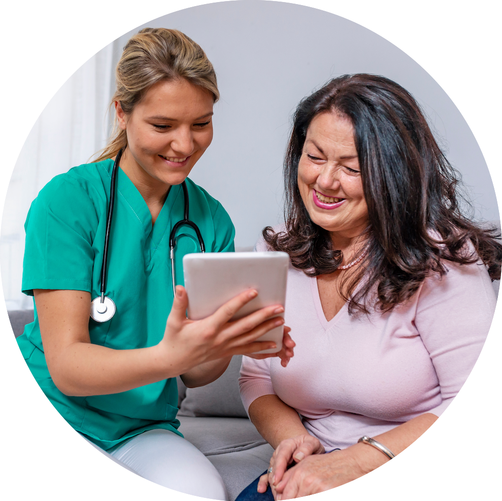 Nurse shares information with client on tablet